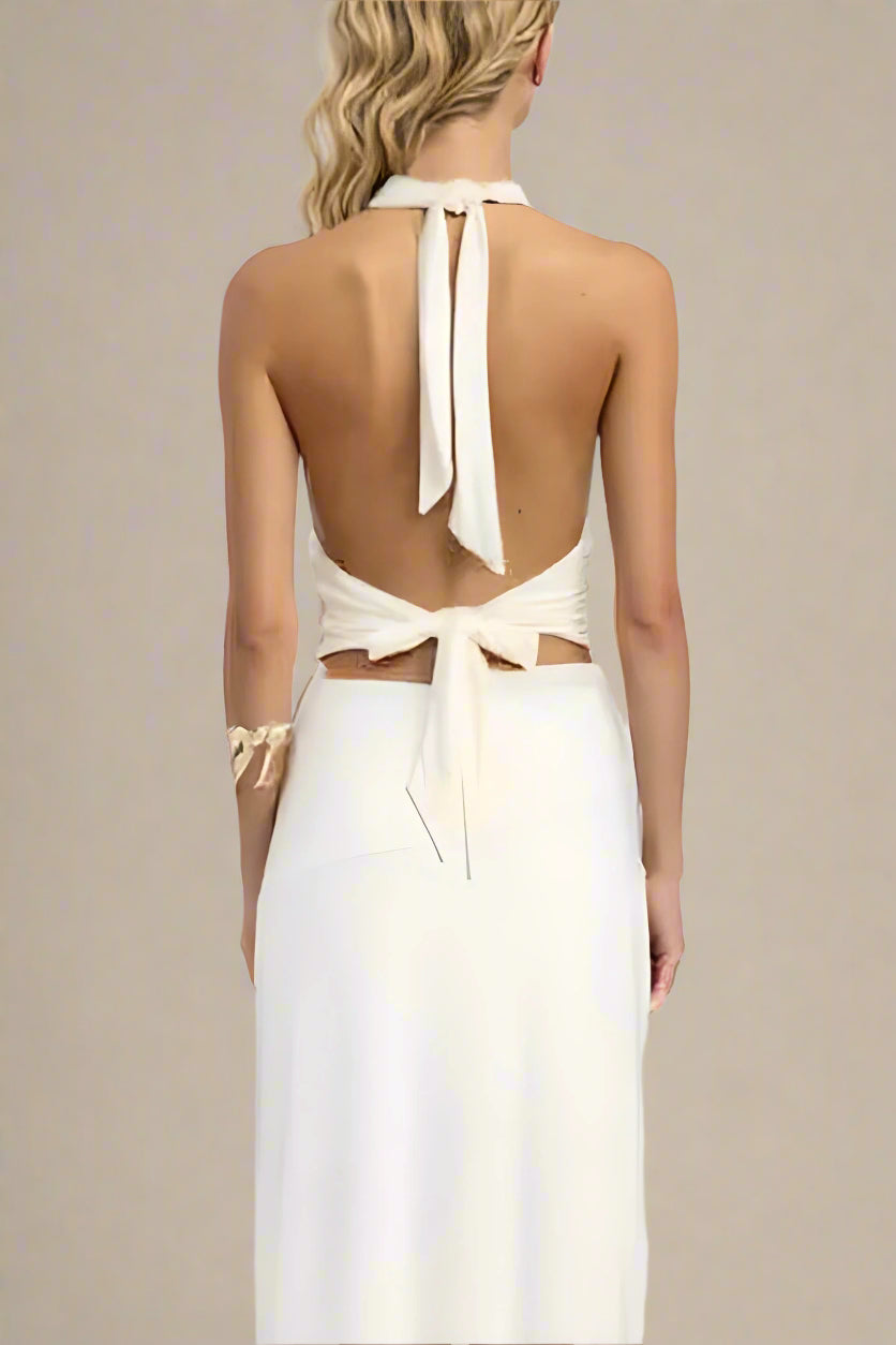 Woman wearing a figure flattering Aby Bodycon Top - White Pearl BODYCON COLLECTION Pty Ltd