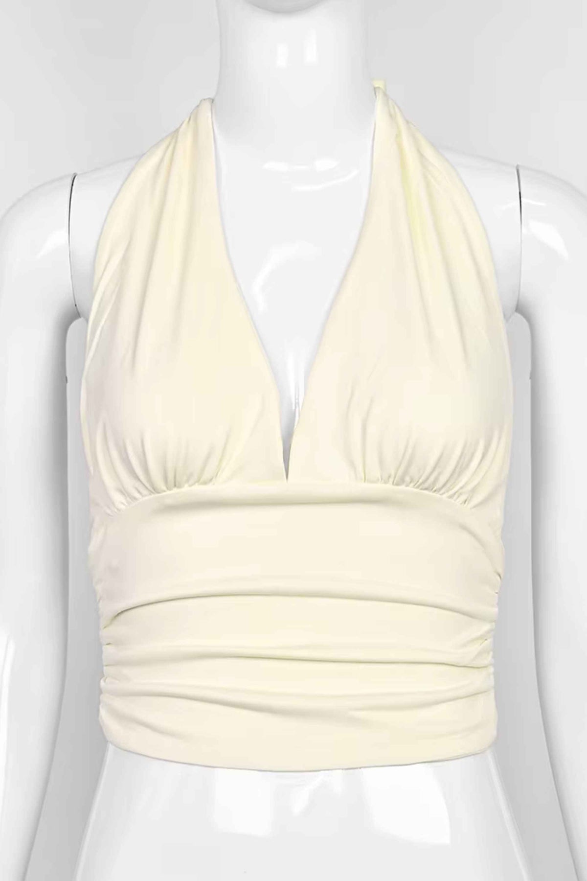 Woman wearing a figure flattering Aby Halter Top - Butter Yellow BODYCON COLLECTION Pty Ltd