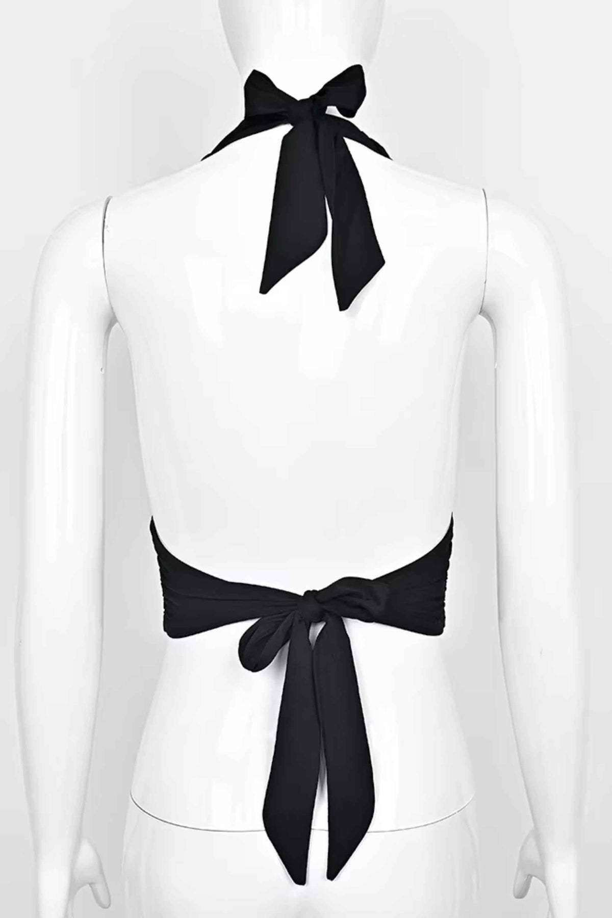 Woman wearing a figure flattering Aby Halter Top - Classic Black BODYCON COLLECTION Pty Ltd