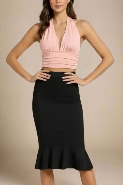 Woman wearing a figure flattering Aby Halter Top - Pink Peach Fuzz BODYCON COLLECTION Pty Ltd