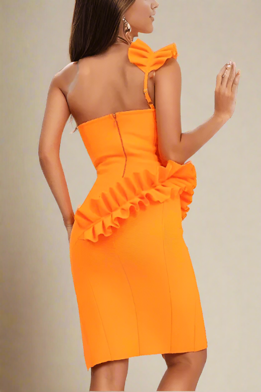 Woman wearing a figure flattering Aimee Bodycon Dress - Apricot Orange BODYCON COLLECTION