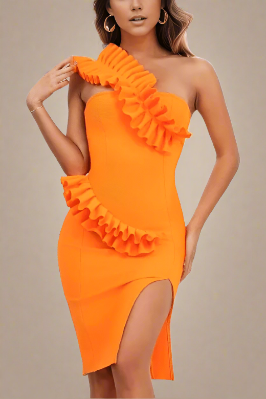 Woman wearing a figure flattering Aimee Bodycon Dress - Apricot Orange BODYCON COLLECTION