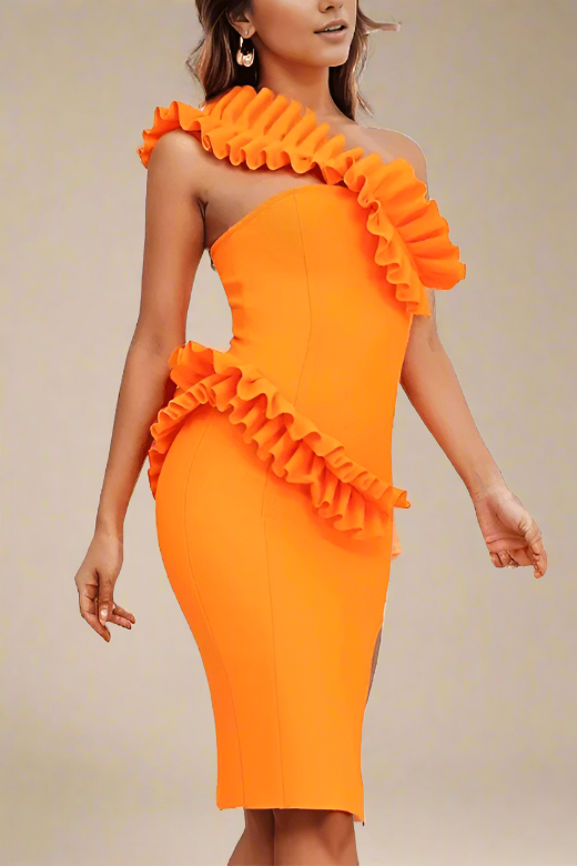 Woman wearing a figure flattering Aimee Bodycon Dress - Apricot Orange BODYCON COLLECTION