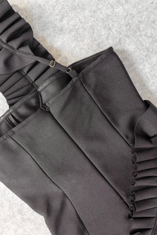 Woman wearing a figure flattering Aimee Bodycon Dress - Classic Black BODYCON COLLECTION