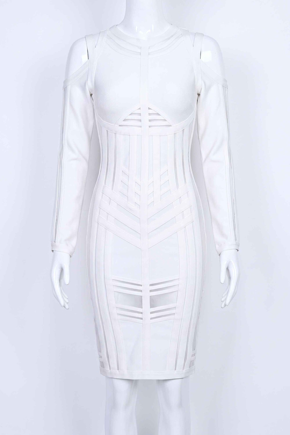 Woman wearing a figure flattering Amelia Long Sleeve Bandage Dress - Pearl White BODYCON COLLECTION