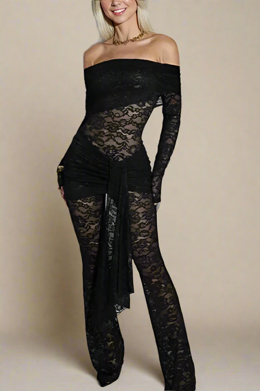 Woman wearing a figure flattering Andie Long Sleeve Bodycon Wrap Jumpsuit - Classic Black BODYCON COLLECTION