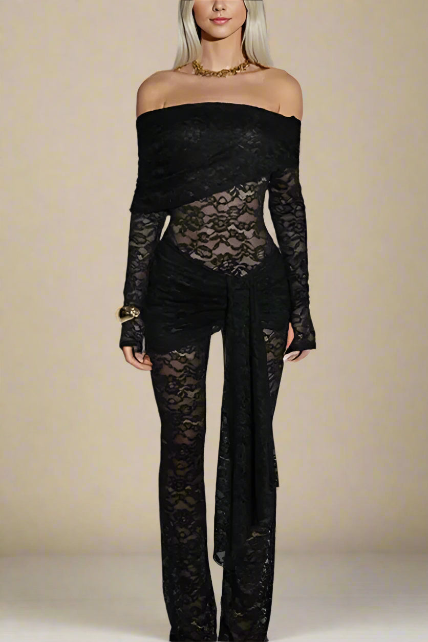 Woman wearing a figure flattering Andie Long Sleeve Bodycon Wrap Jumpsuit - Classic Black BODYCON COLLECTION