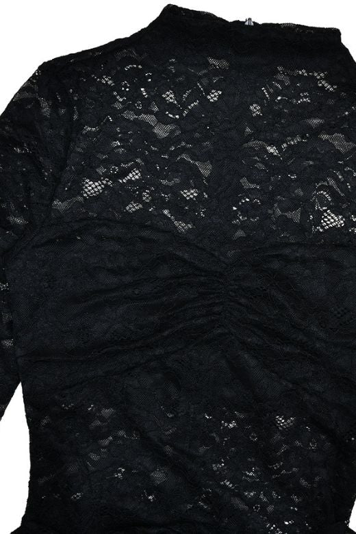 Woman wearing a figure flattering Andie Long Sleeve Bodycon Wrap Mini Dress - Classic Black BODYCON COLLECTION