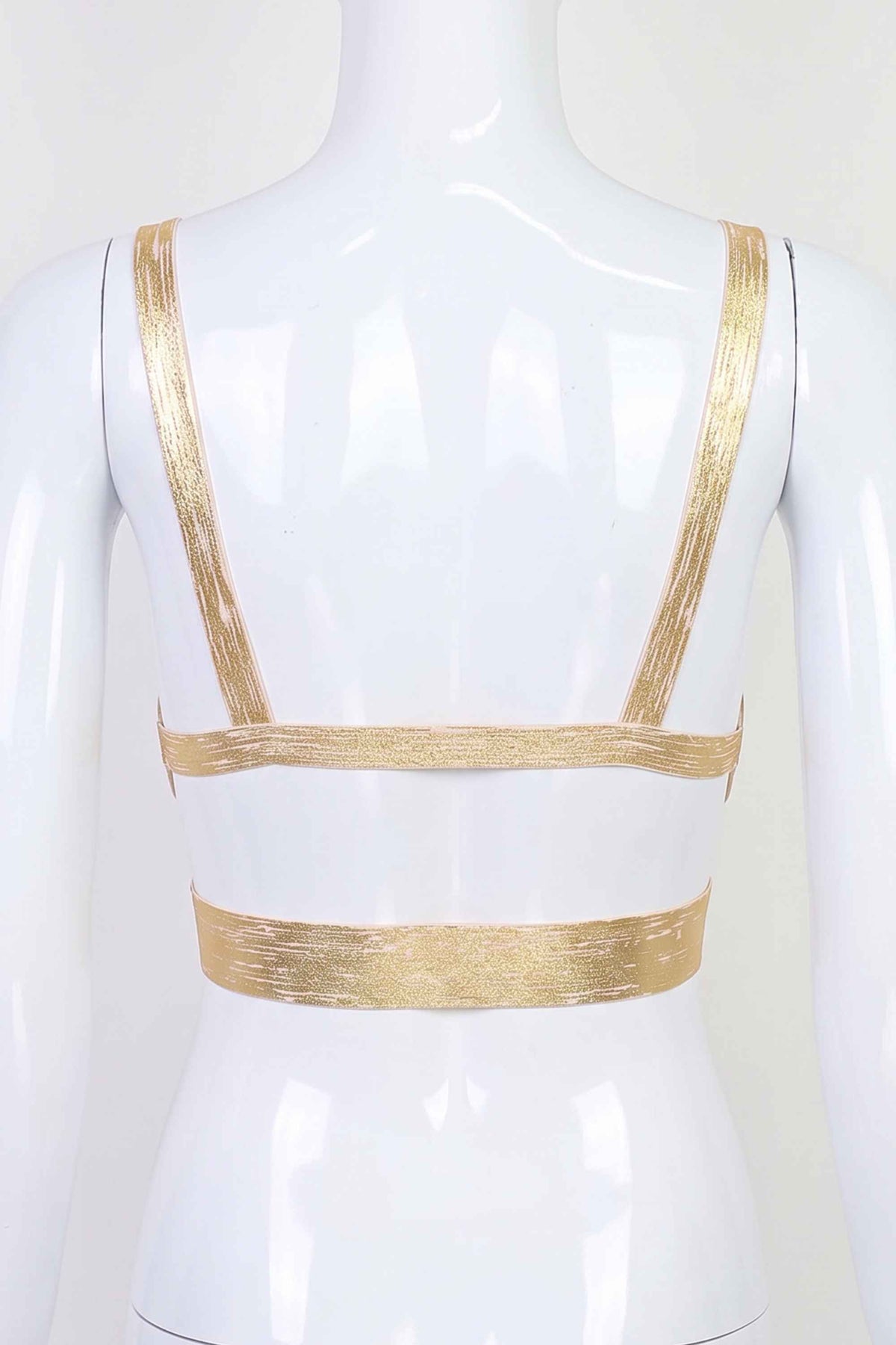 Woman wearing a figure flattering Ang Bandage Crop Top - Gold BODYCON COLLECTION