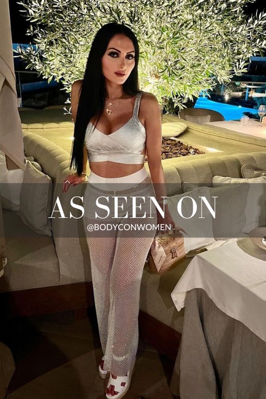 Woman wearing a figure flattering Ang Bandage Crop Top - Pearl White BODYCON COLLECTION