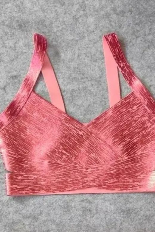 Woman wearing a figure flattering Ang Bandage Metallic Crop Top - Hot Pink BODYCON COLLECTION