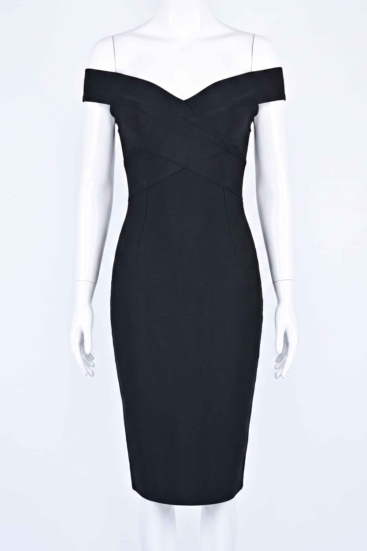 Woman wearing a figure flattering Ash Bandage Dress - Classic Black Bodycon Collection