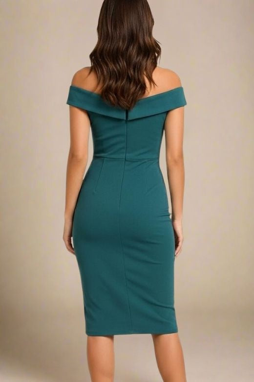 Woman wearing a figure flattering Ash Bandage Dress - Emerald Green Bodycon Collection