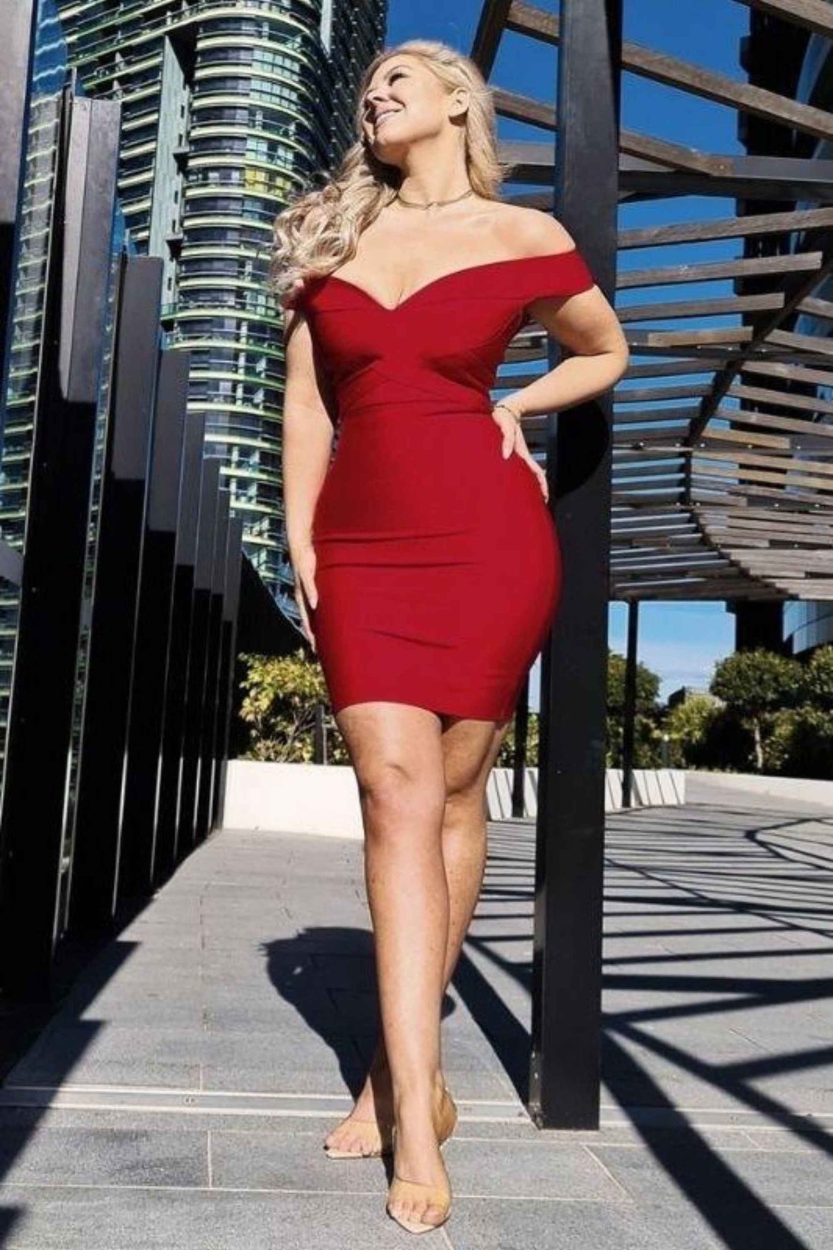 Woman wearing a figure flattering Ash Bandage Dress - Red Wine Bodycon Collection