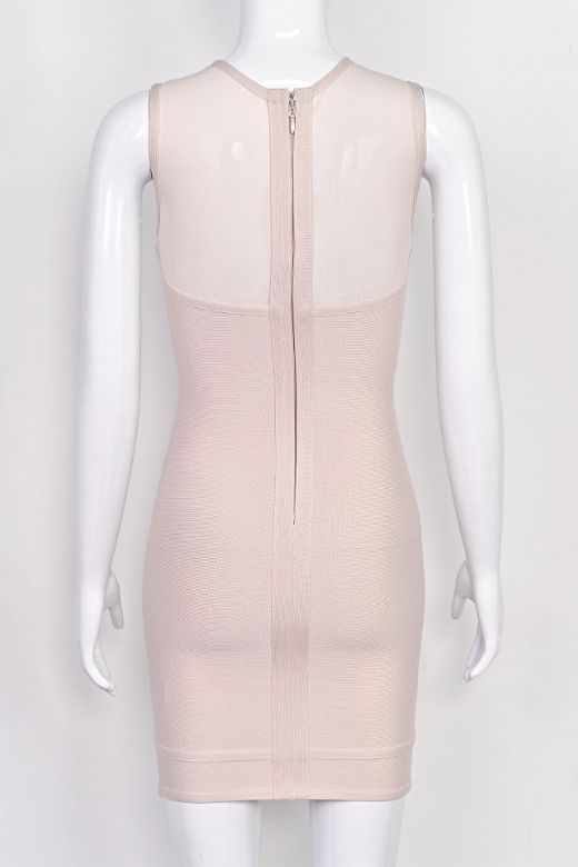 Woman wearing a figure flattering Aspen Bodycon Mini Dress - Nude BODYCON COLLECTION Pty Ltd