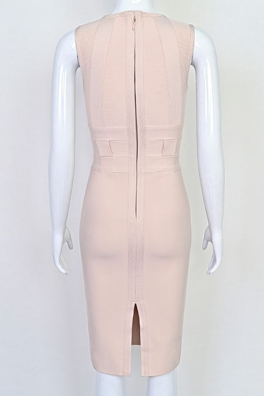 Woman wearing a figure flattering Aurora Bandage Dress - Cream BODYCON COLLECTION Pty Ltd