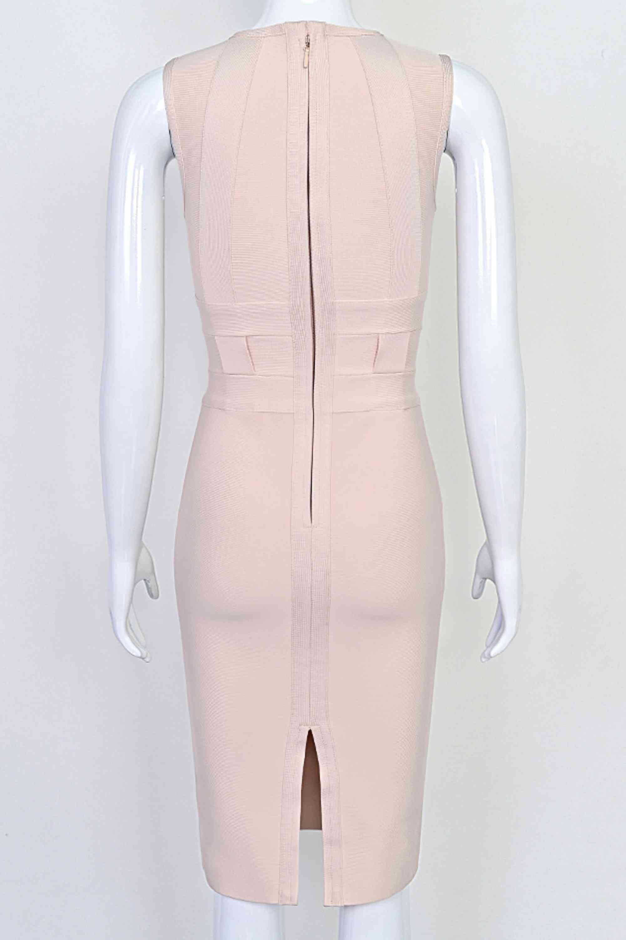 Woman wearing a figure flattering Aurora Bandage Dress - Cream BODYCON COLLECTION Pty Ltd
