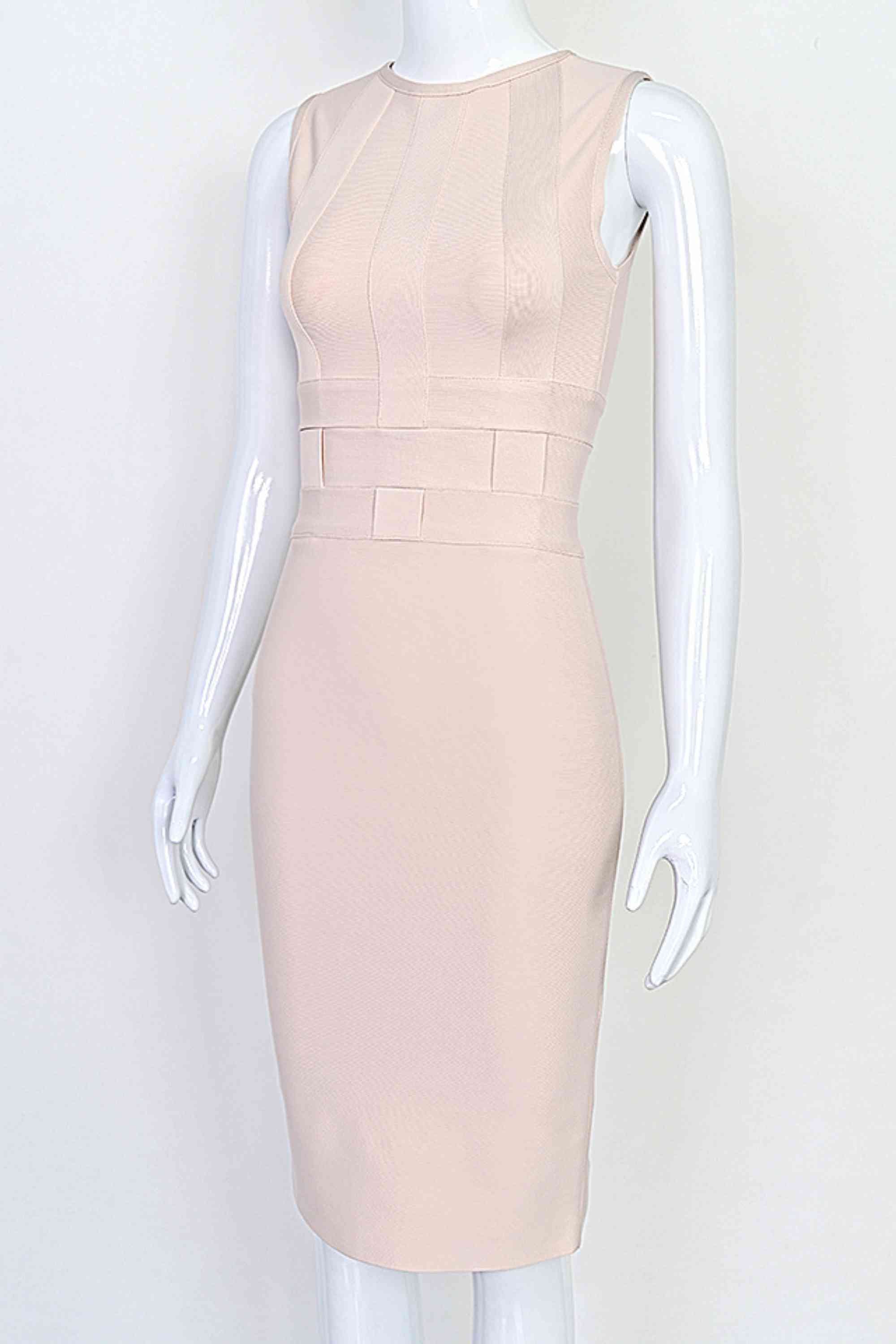 Woman wearing a figure flattering Aurora Bandage Dress - Cream BODYCON COLLECTION Pty Ltd