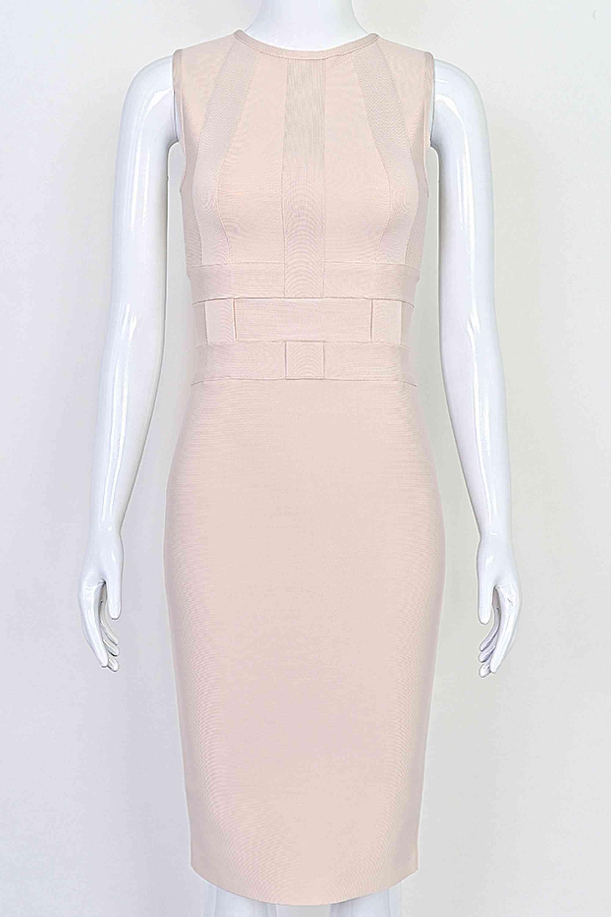 Woman wearing a figure flattering Aurora Bandage Dress - Cream BODYCON COLLECTION Pty Ltd