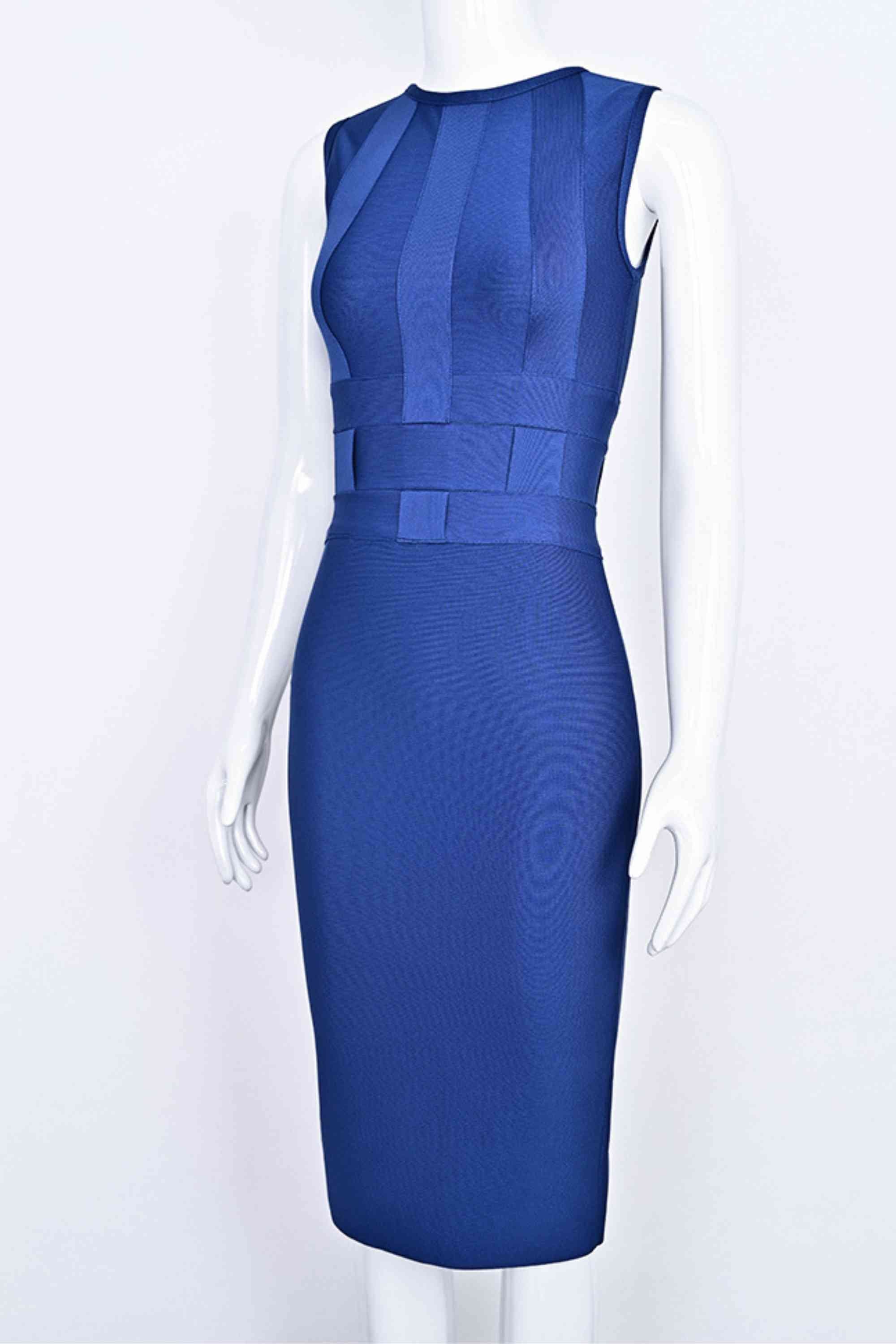 Woman wearing a figure flattering Aurora Bandage Dress - Navy Blue BODYCON COLLECTION Pty Ltd
