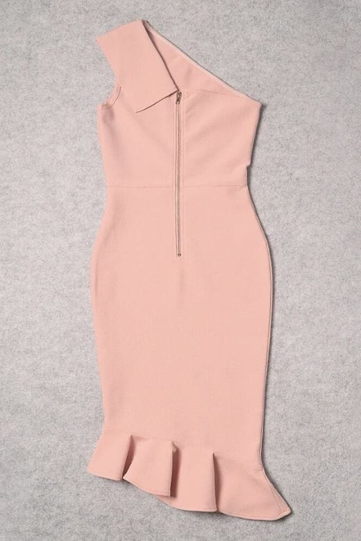 Woman wearing a figure flattering Avery Bandage Dress - Dusty Pink BODYCON COLLECTION