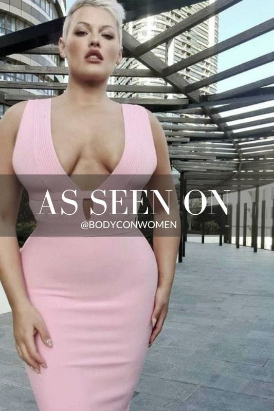 Woman wearing a figure flattering Bay Bandage Dress - Ballet Pink Bodycon Collection