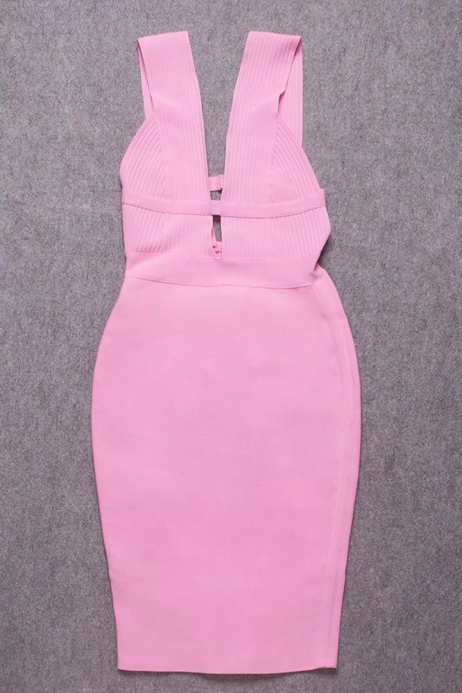 Woman wearing a figure flattering Bay Bandage Dress - Blush Pink Bodycon Collection