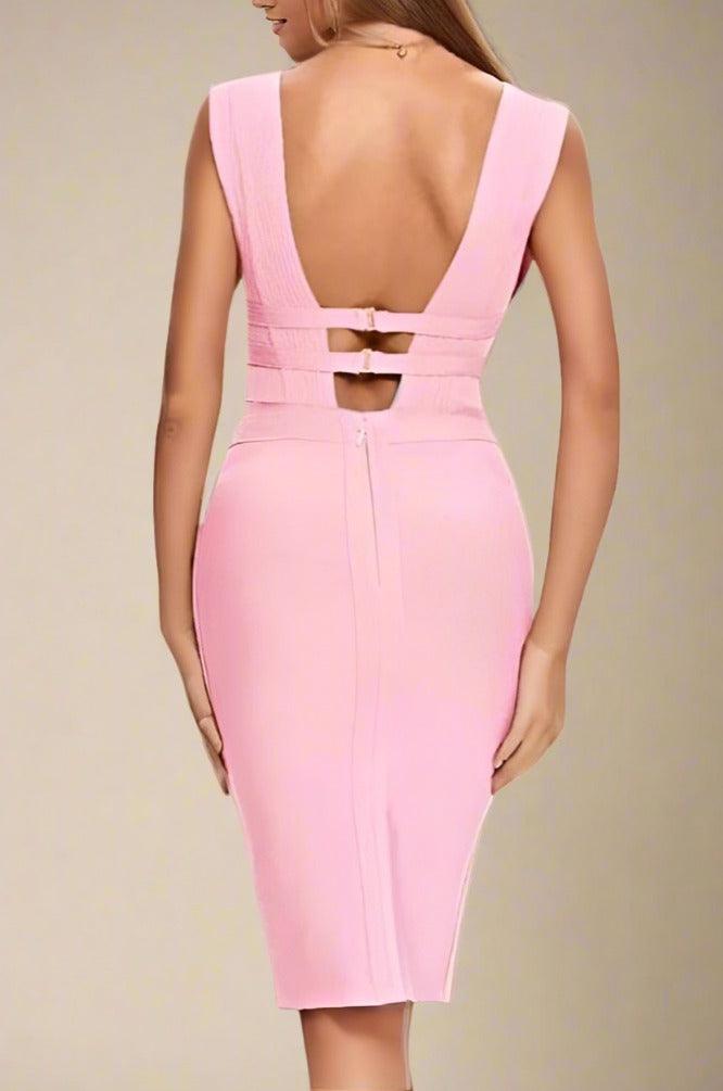 Woman wearing a figure flattering Bay Bandage Dress - Blush Pink Bodycon Collection