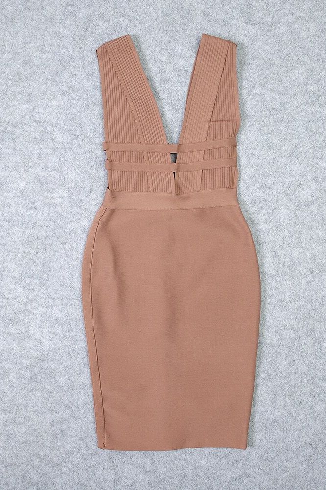Woman wearing a figure flattering Bay Bandage Dress - Nude Bodycon Collection