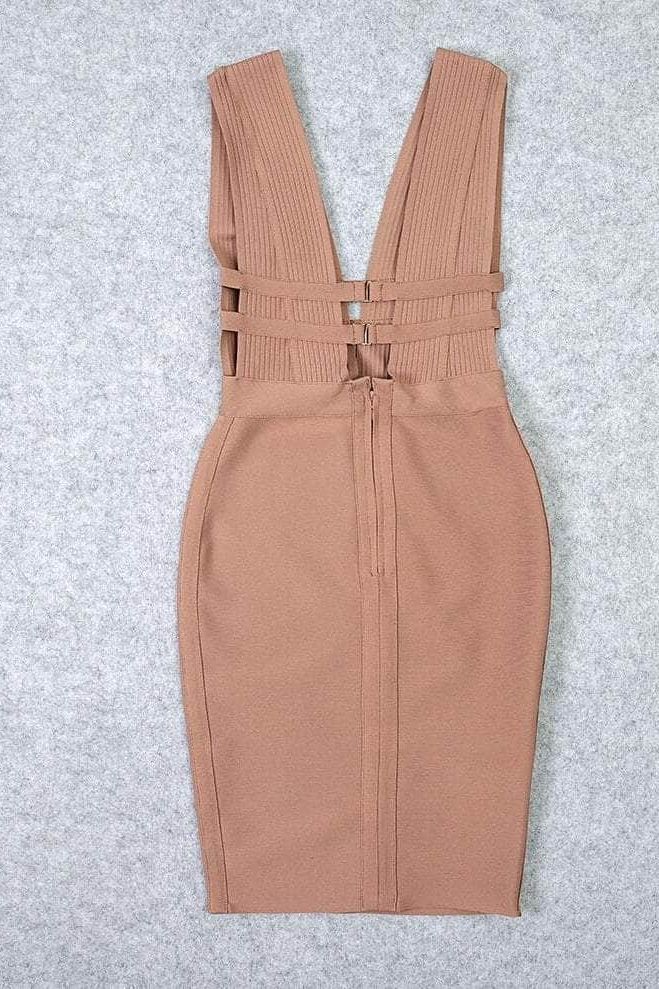Woman wearing a figure flattering Bay Bandage Dress - Nude Bodycon Collection