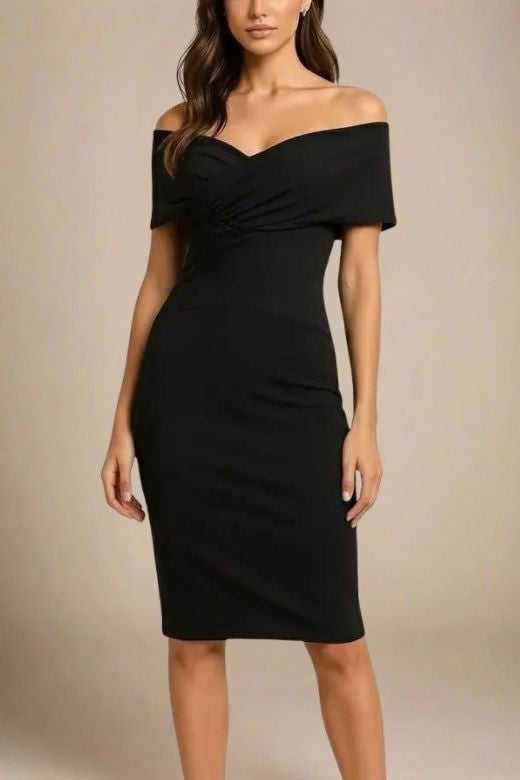 Woman wearing a figure flattering Bea Bandage Dress - Classic Black Bodycon Collection