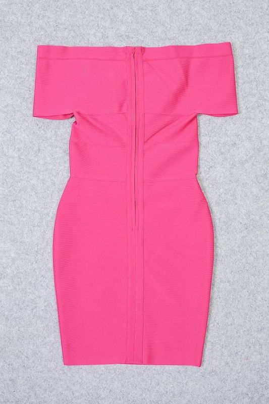Woman wearing a figure flattering Bea Bandage Dress - Hot Pink Bodycon Collection