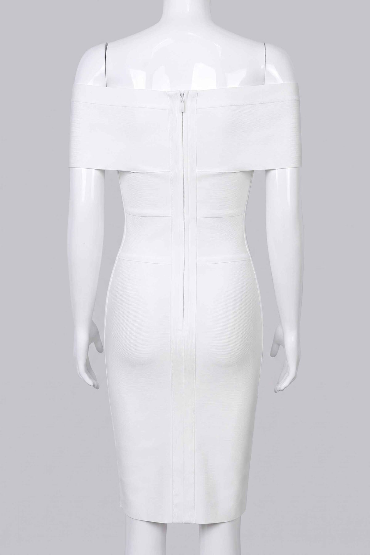 Woman wearing a figure flattering Bea Bandage Dress - Pearl White Bodycon Collection