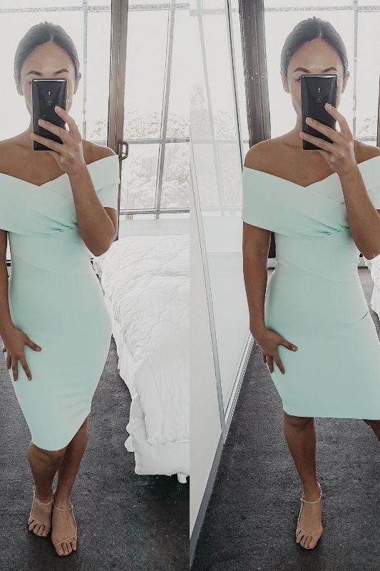 Woman wearing a figure flattering Bea Bandage Dress - Pearl White Bodycon Collection