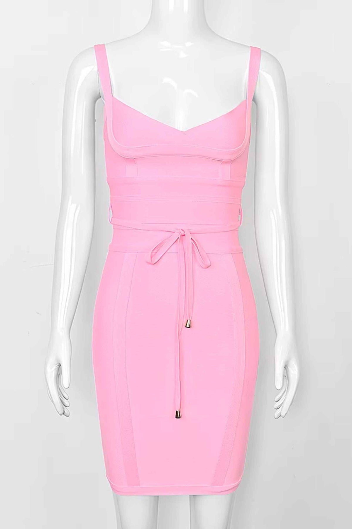 Woman wearing a figure flattering Bek Bandage Dress - Blush Pink Bodycon Collection