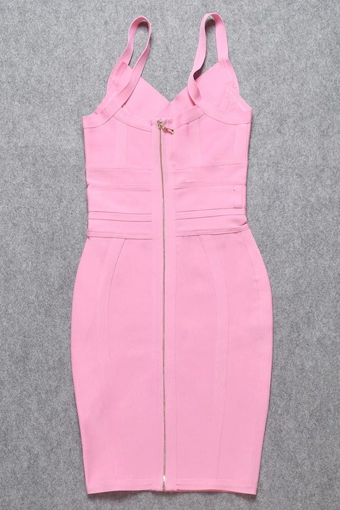 Woman wearing a figure flattering Bek Bandage Dress - Blush Pink Bodycon Collection