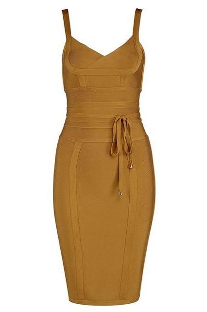 Woman wearing a figure flattering Bek Bandage Dress - Mustard Yellow Bodycon Collection