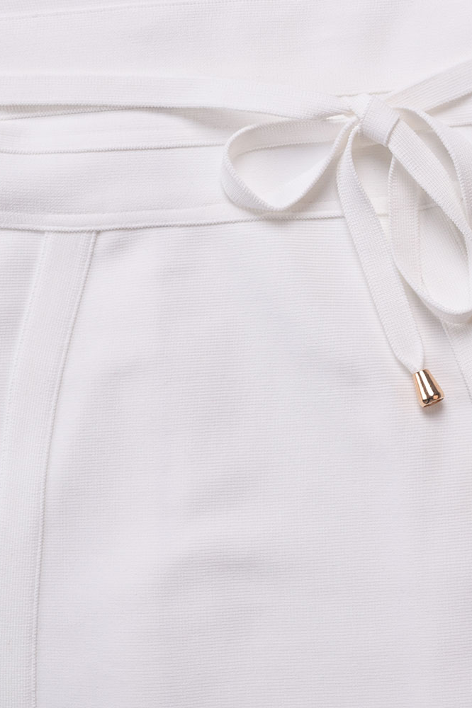 Woman wearing a figure flattering Bek Bandage Dress - Pearl White Bodycon Collection