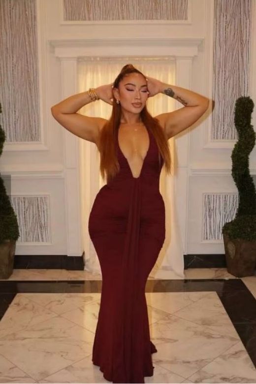 Woman wearing a figure flattering Bella Bodycon Wrap Maxi Dress - Classic Black BODYCON COLLECTION Pty Ltd