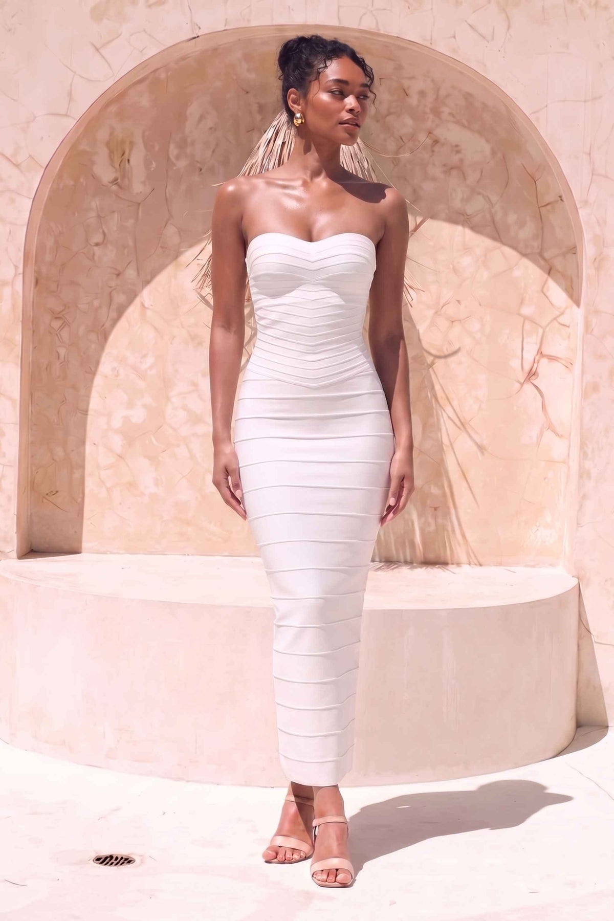 Woman wearing a figure flattering Belle Bandage Maxi Dress - White Pearl BODYCON COLLECTION Pty Ltd
