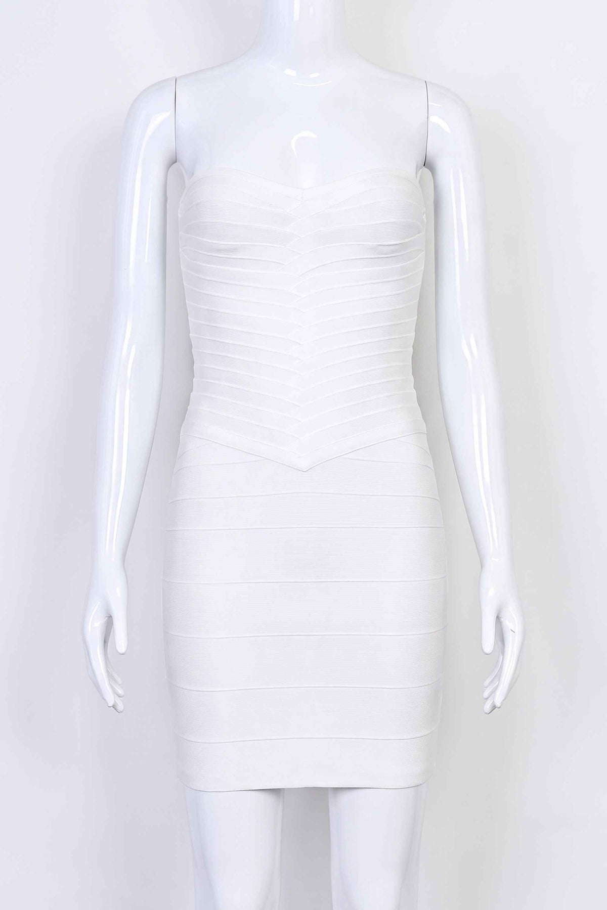 Woman wearing a figure flattering Belle Bandage Mini Dress - White Pearl BODYCON COLLECTION Pty Ltd
