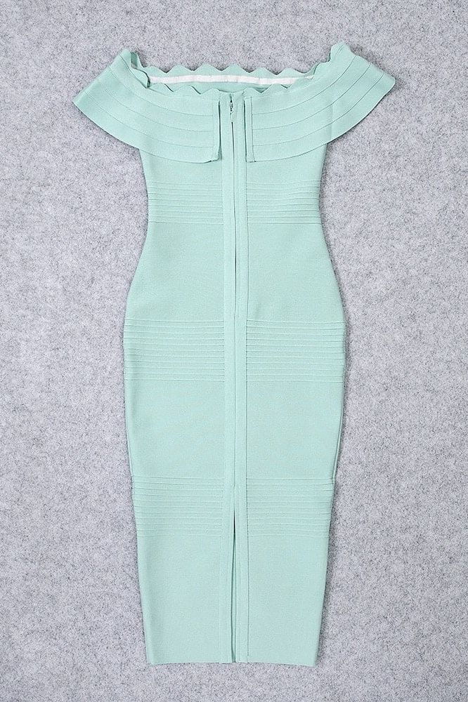 Woman wearing a figure flattering Billie Bandage Midi Dress - Mint Green Bodycon Collection