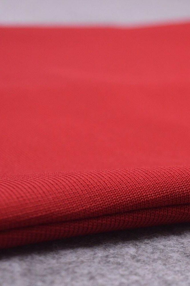 Woman wearing a figure flattering Blanche Bandage Midi Dress - Lipstick Red BODYCON COLLECTION