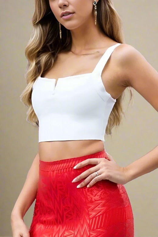 Woman wearing a figure flattering Brooke Bandage Crop Top - Pearl White BODYCON COLLECTION
