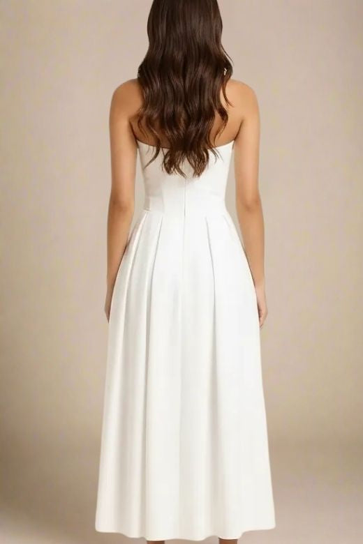 Woman wearing a figure flattering Capri Bodycon Strapless Midi Dress - Pearl White BODYCON COLLECTION