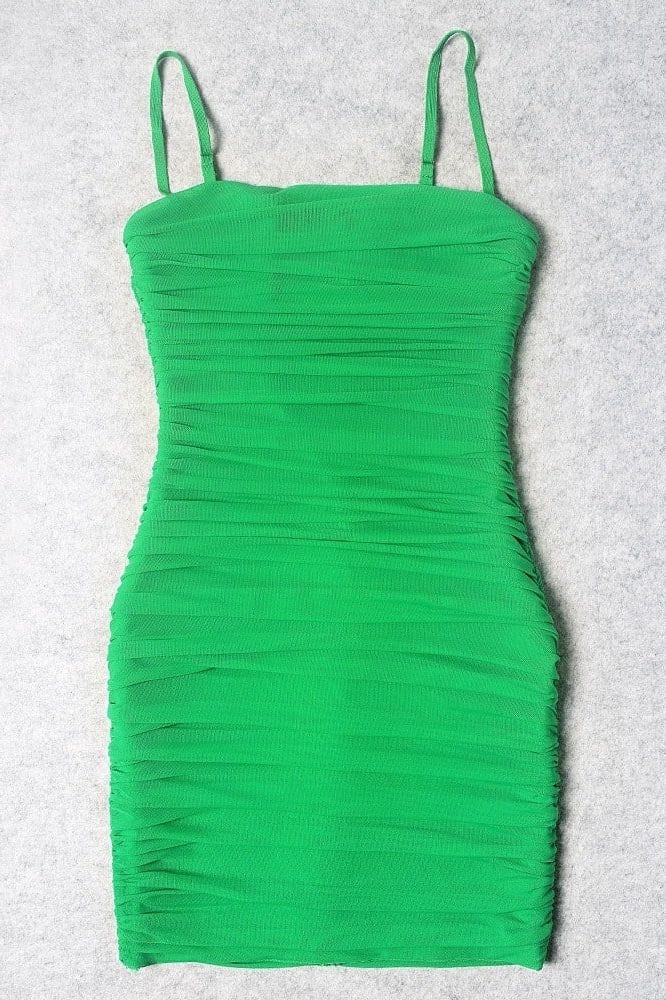 Woman wearing a figure flattering Cassie Bodycon Wrap Mini Dress - Neon Green BODYCON COLLECTION