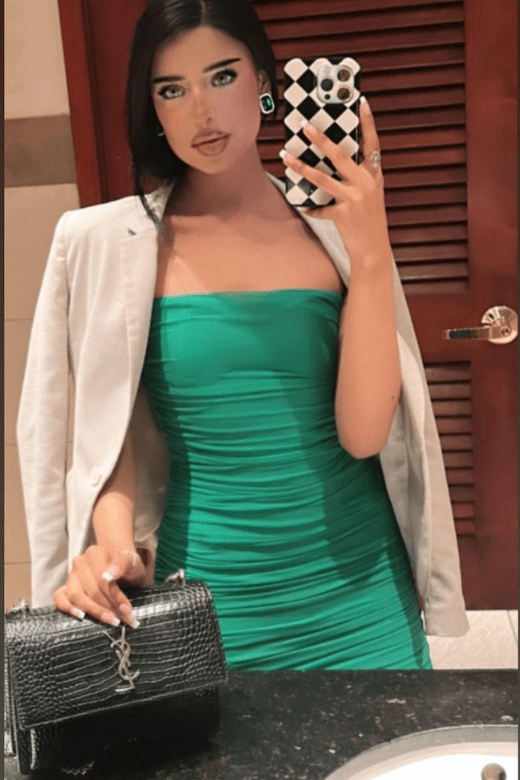 Woman wearing a figure flattering Cassie Bodycon Wrap Mini Dress - Neon Green BODYCON COLLECTION