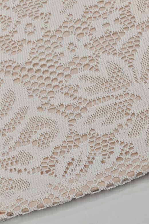 Woman wearing a figure flattering Charlotte Long Sleeve Bodycon Mini Dress - Cream BODYCON COLLECTION