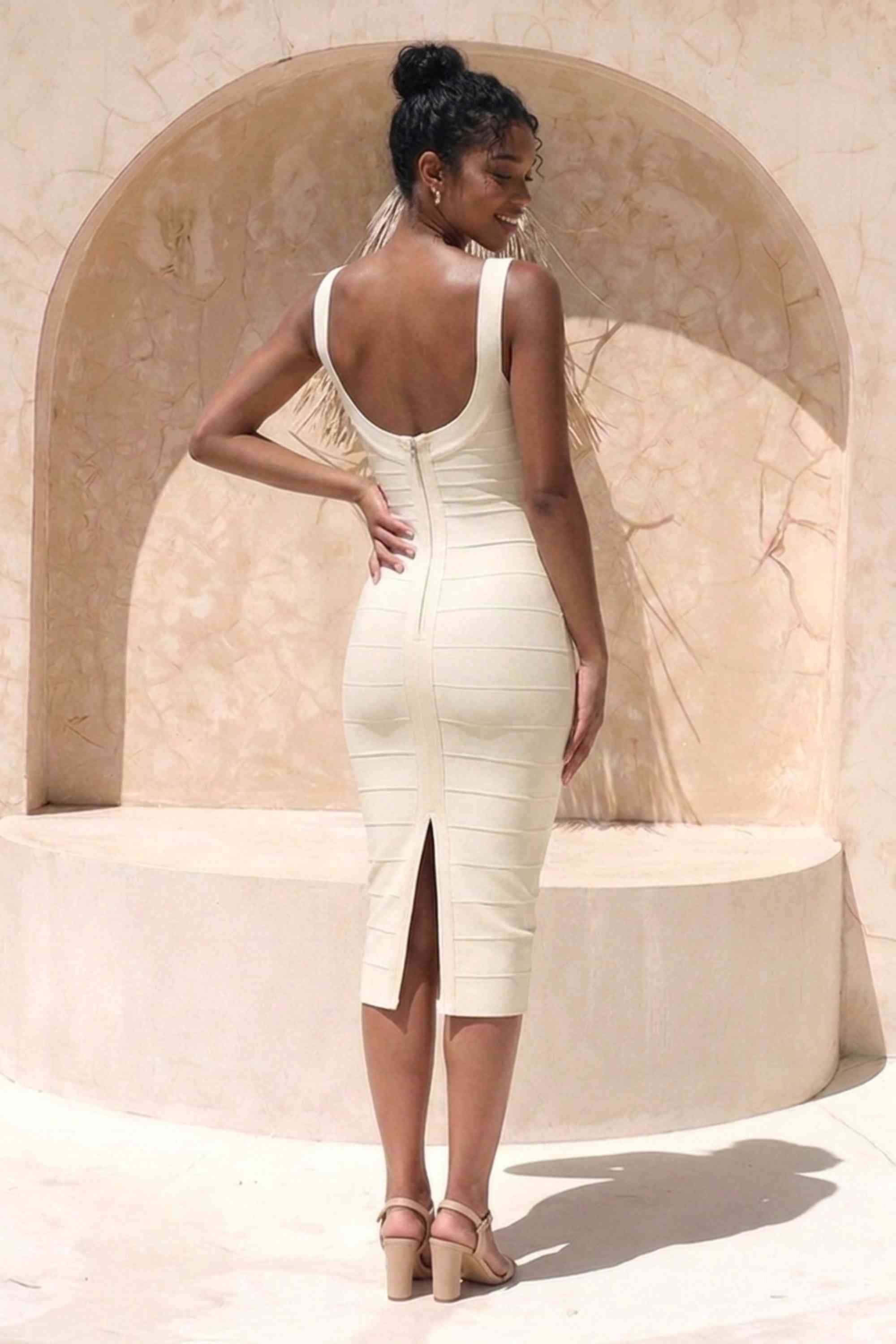 Woman wearing a figure flattering Cindy Bandage Midi Dress - Cream BODYCON COLLECTION Pty Ltd