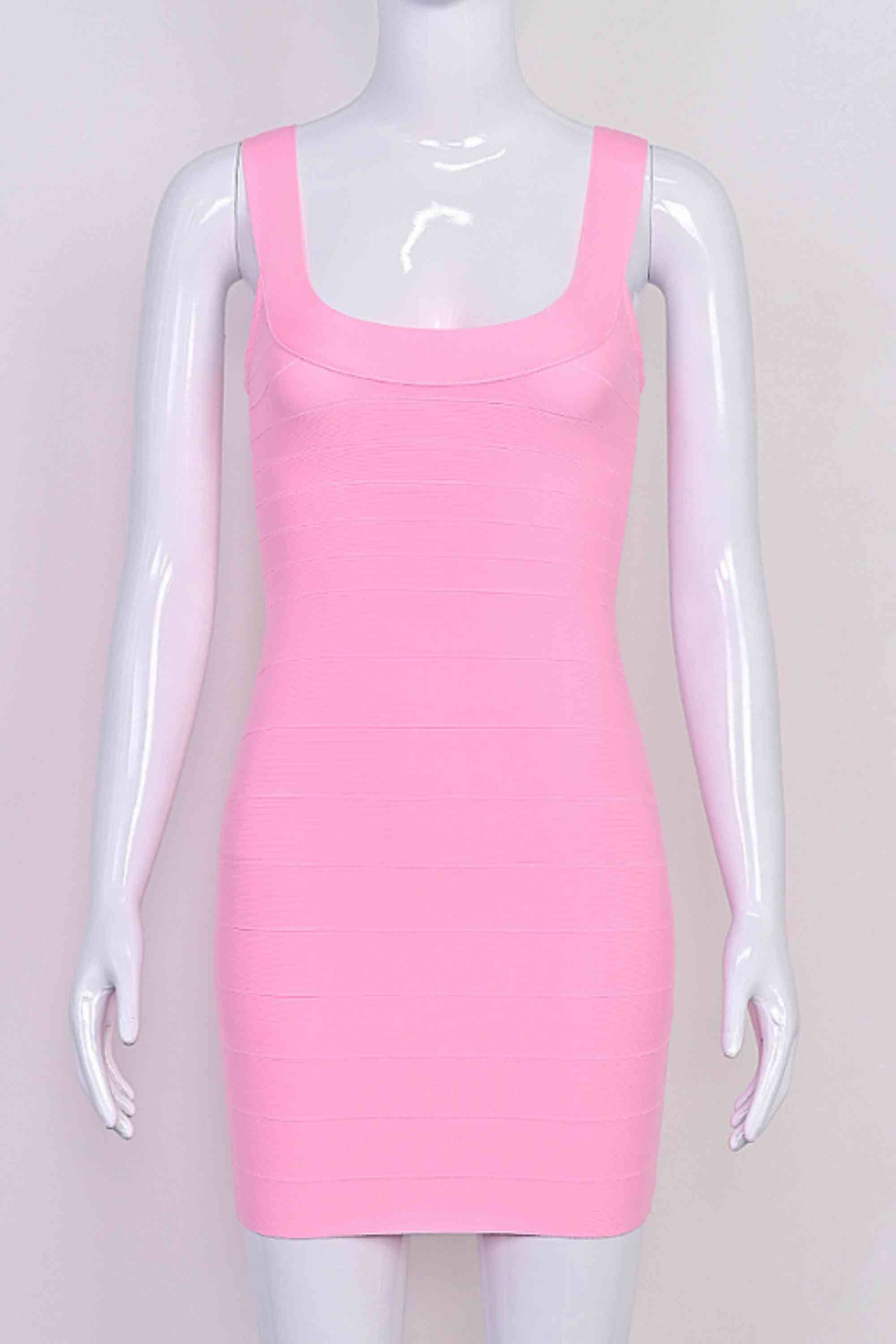 Woman wearing a figure flattering Cindy Bandage Mini Dress - Blush Pink BODYCON COLLECTION Pty Ltd